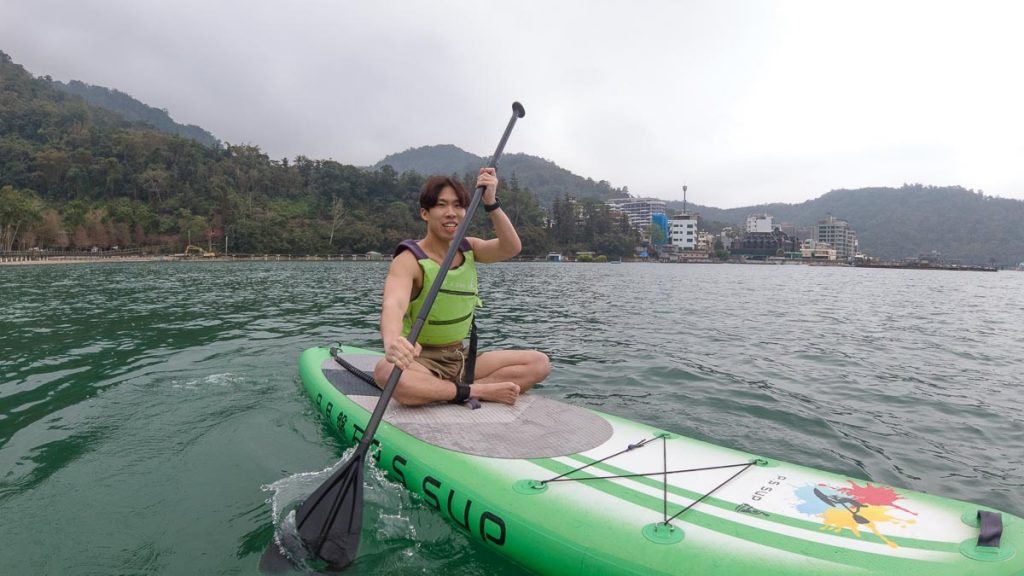 Boy Paddling in Sun Moon Lake - Things to do in Nantou