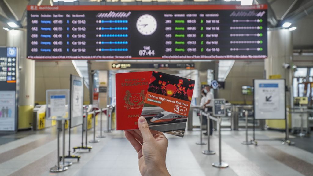 Holding THSR Pass and Passport - THSR Guide