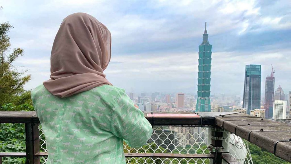 Girl Looking at Taipei 101 - Things to do in Taipei