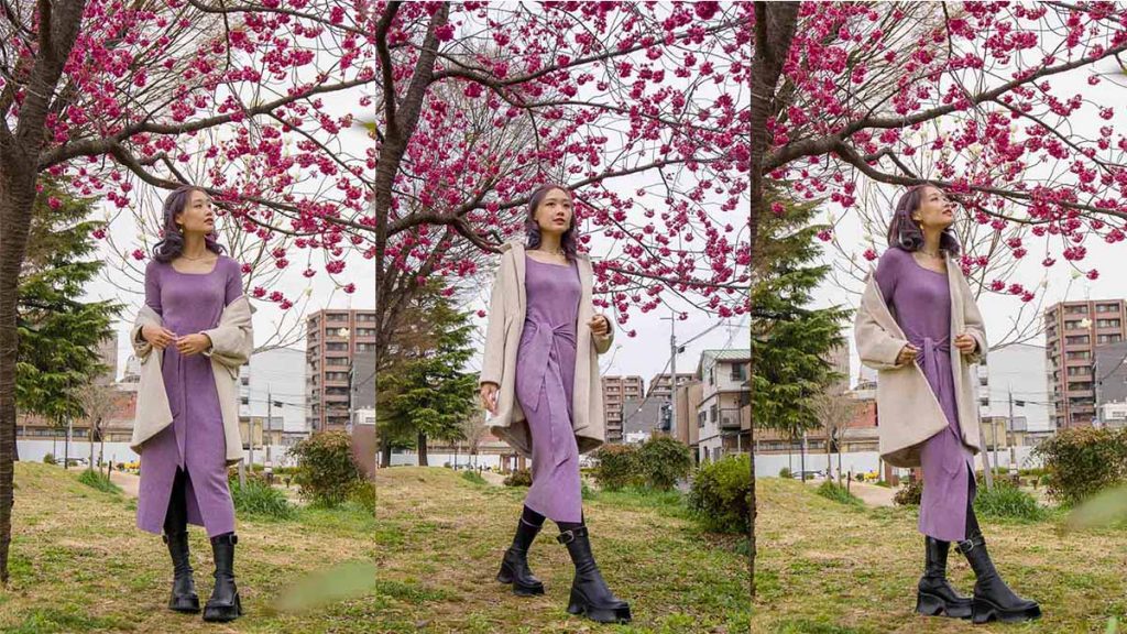 Girl in purple dress under a cherry blossom tree - travel outfit ideas