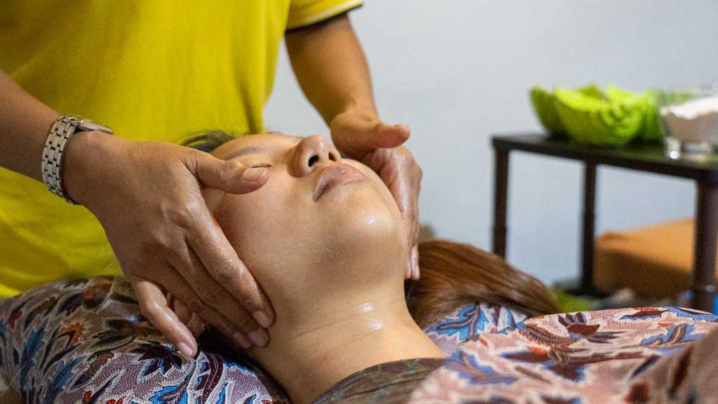 Girl getting a face massage at Absolute Spa - Things to do in Batam