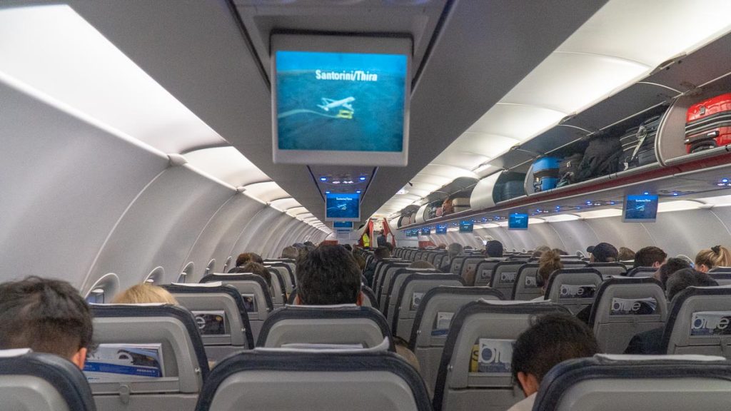 People on Flight to Santorini - Greece Itinerary