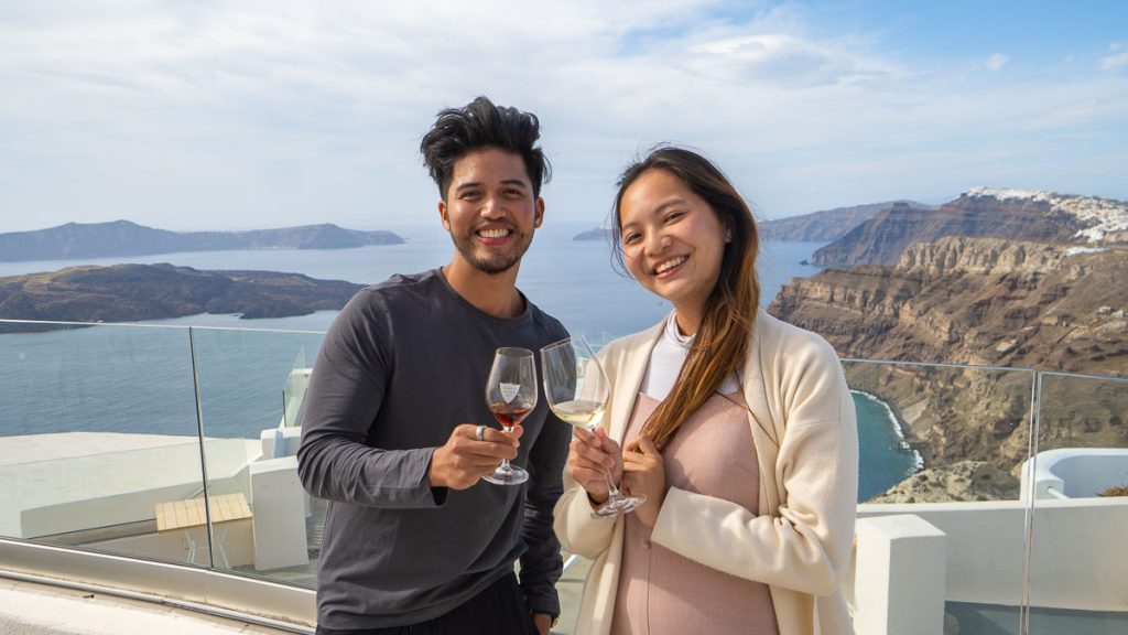 Guy and Girl Holding Wine Glass - Greece Bucket List