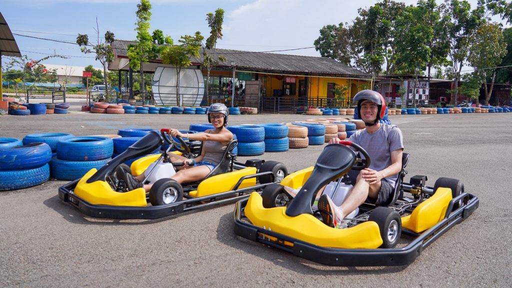 Sitting in go-karts at Golden City Go-kart, Batam — Things to do in Batam