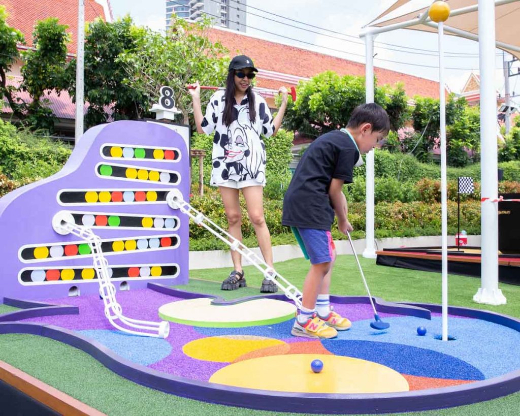 People Playing Minigolf Exclusive Disney themed Destinations