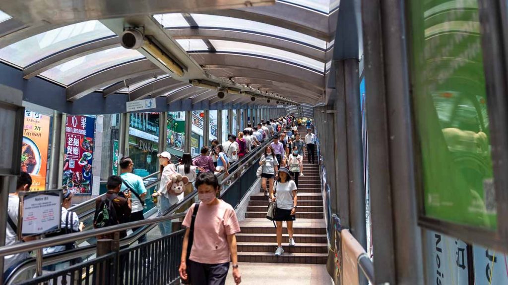 people passing through the central mid levels escalators - hong kong itinerary