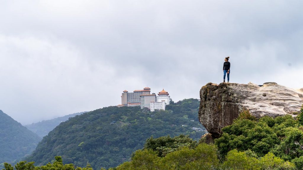 Girl standing on the cliff in the Junjimyan trail