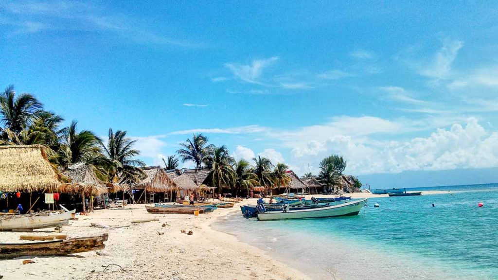 a beach in honduras - lesser known destinations