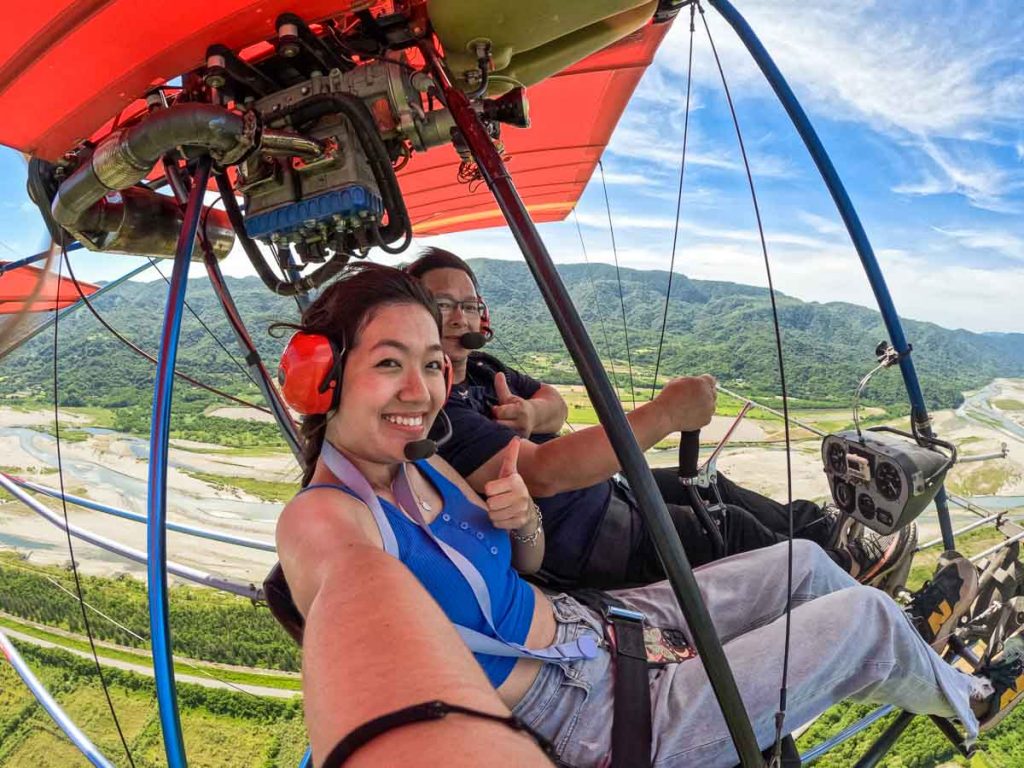 Girl and pilot on a light aircraft - adventures in Taiwan