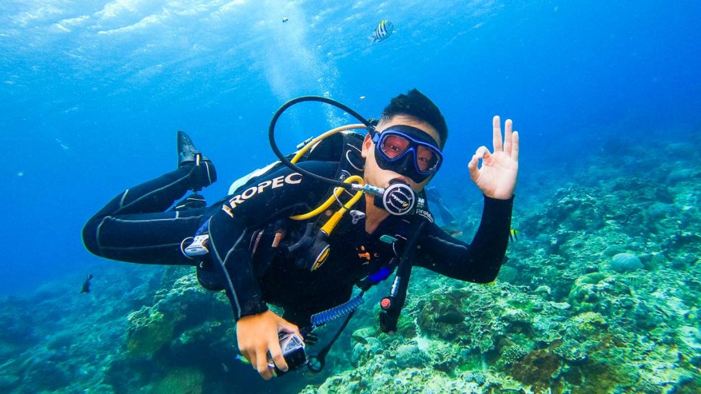 Man diving in Chaikuo, Green Island - Things to do in Taiwan