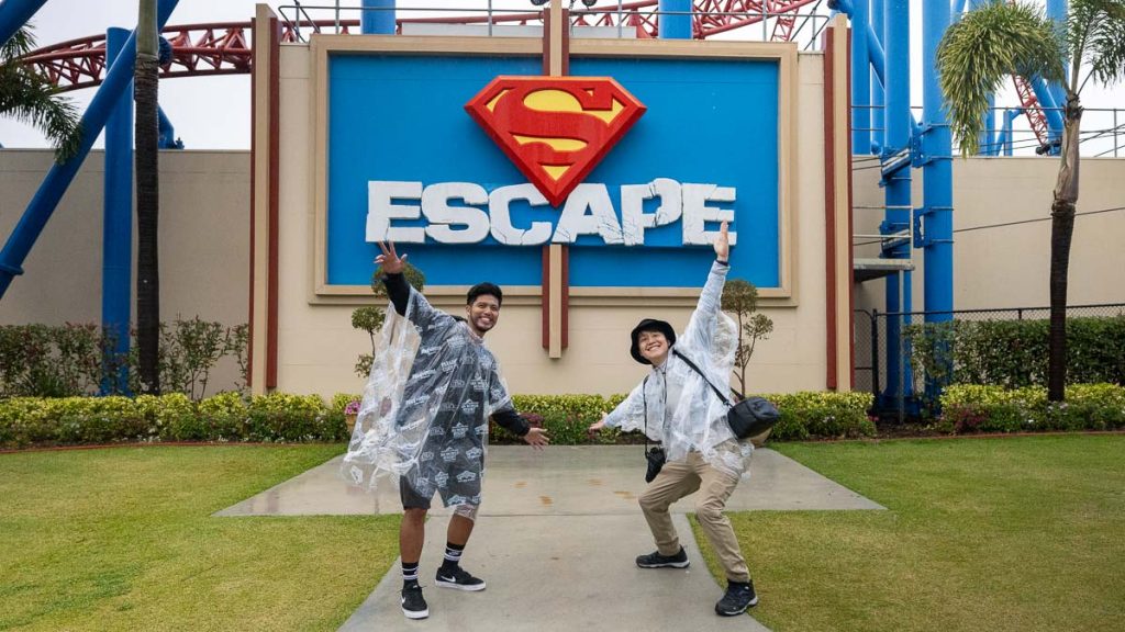 Posing at Warner Bros Movie World - Camper Van Road Trip Gold Coast Itinerary