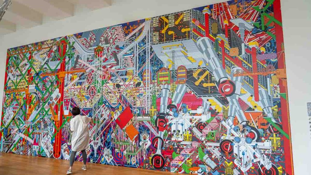 a large mural commissioned by m+ museum - hong kong itinerary