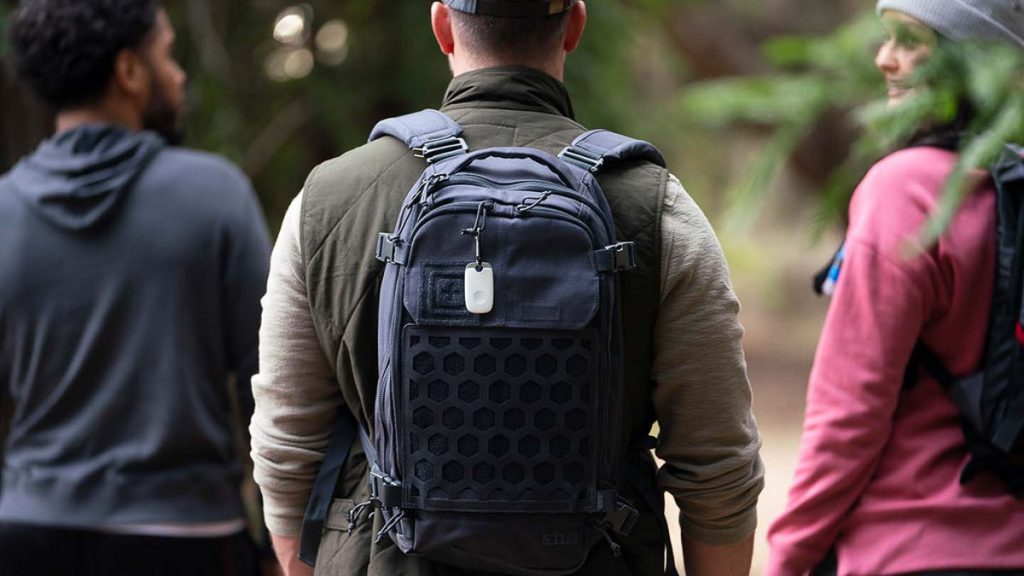 Tile Tracker on Man's Bag - Travel Essentials