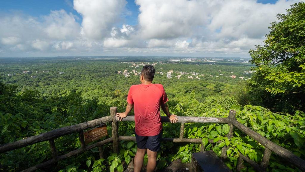 Man Looking at View from Leiqiong Global Geopark - Hainan Itinerary
