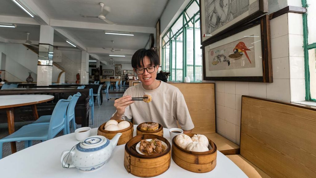 Lung Wah Tea House Eating Dim Sum - Macao itinerary