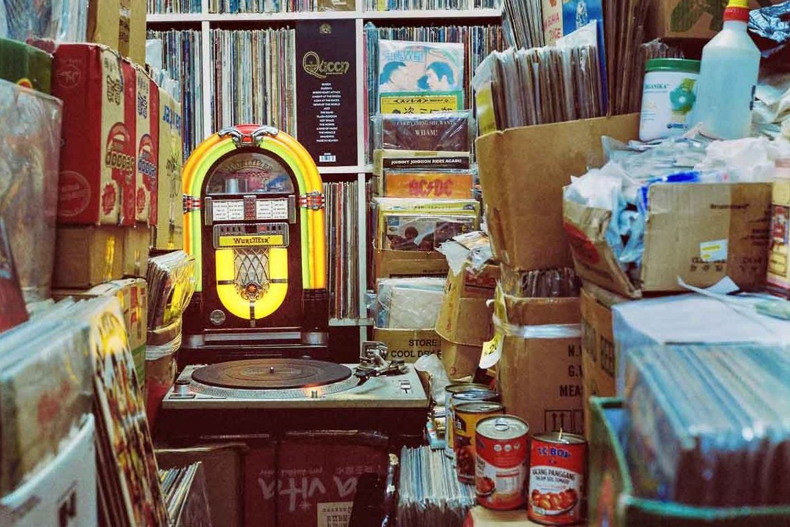 Jukebox among boxes of records and clutter at Vinyl Hero - Things To Do In Hong Kong, Sham Shui Po