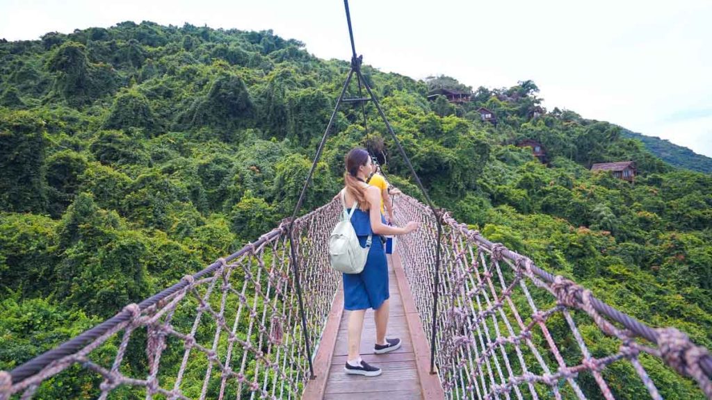 Girl Crossing Dragon Rope Bridge - Things to do in China