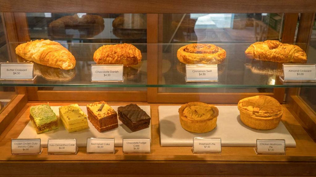 Brew & Co. glass case of pastries  - Things To Do In Singapore