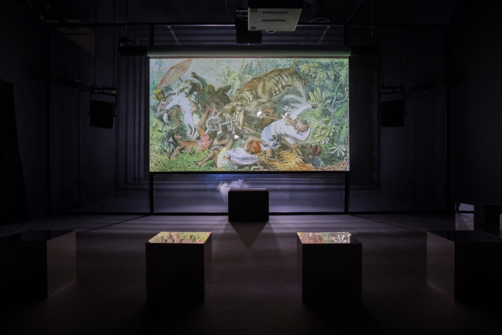 Installation view of Ho Tzu Nyens One or Several Tigers 2017 as part of Ho Tzu Nyen Time the Tiger' at SAM at Tanjong Pagar Distripark. Image courtesy of Singapore Art Museum