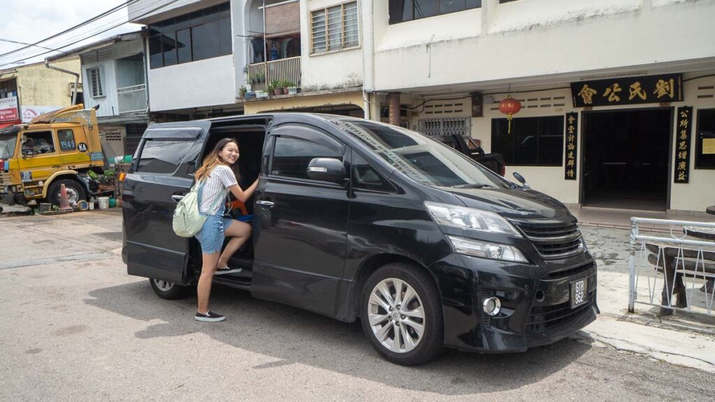 Girl Getting into Car Charter - Day trips from Johor Bahru