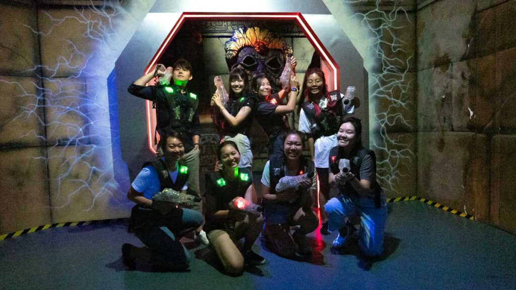 Group of Friends Playing Laser Tag - JB Itinerary