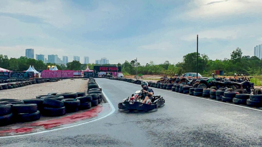 Man go-karting on the track - things to do in Mt Austin