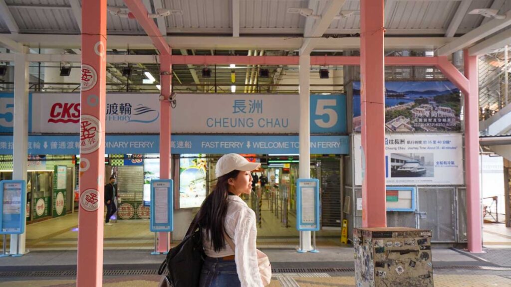 Woman standing in front of Central Ferry Pier No.5