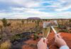 Glasses of Champagne in front of Uluru - Uluru and Surrounds Northern Territory Red Centre Central Australia Itinerary