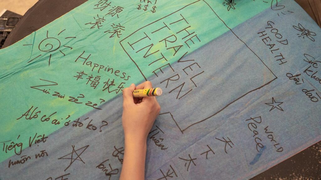 People Writing Wishes on a Paper Lantern - Things to do in JB