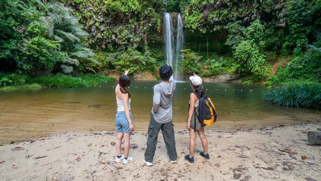 Three People at Latak waterfall - Sarawak guide