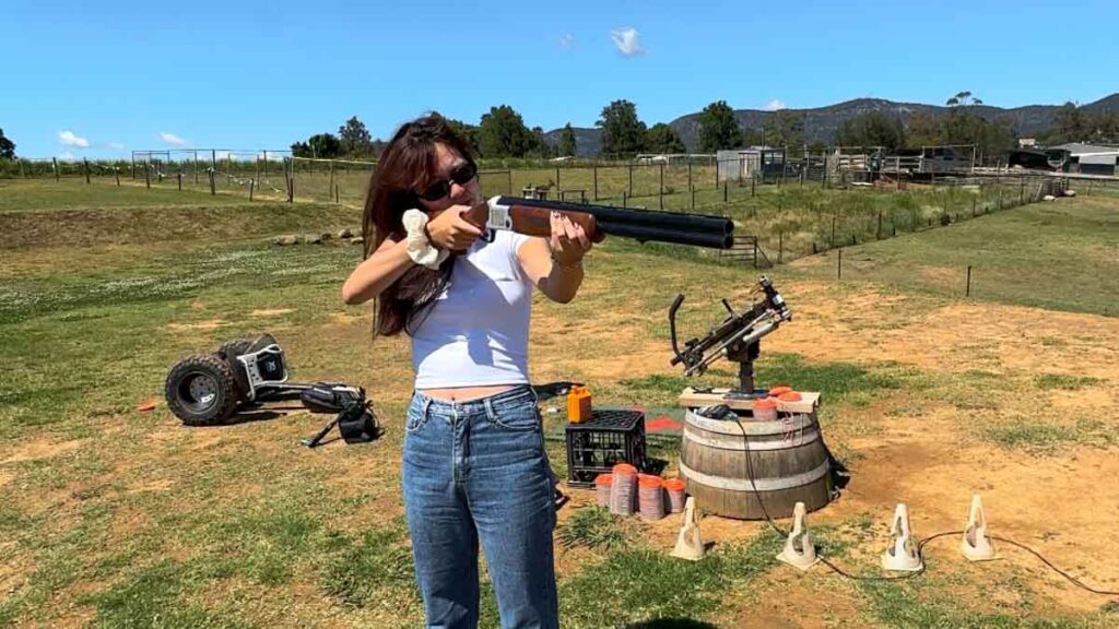 Girl doing laser clay shooting things to do in New south wales