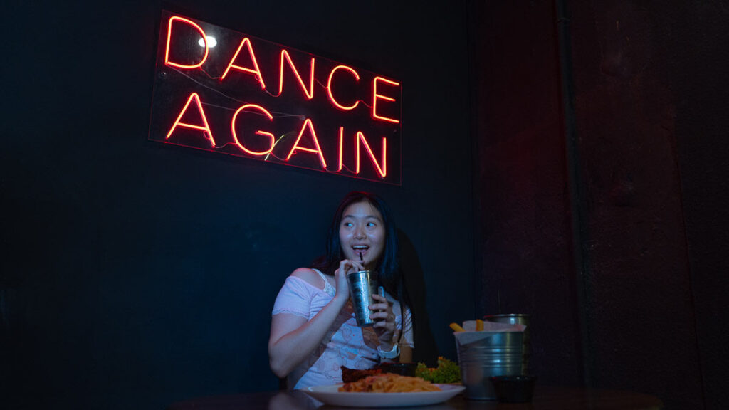 Girl posing with food at Rockstone Cafe - Jalan - Things to eat in Jalan Tan Hiok Nee