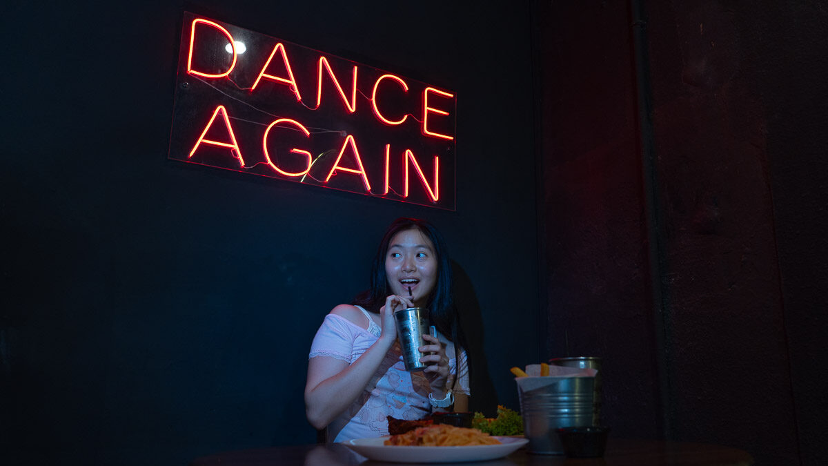 Girl posing with food at Rockstone Cafe - Jalan - Things to eat in Jalan Tan Hiok Nee