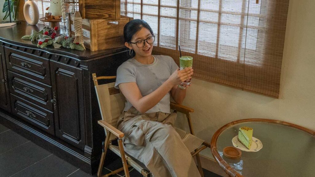 Girl posing with drink 2 at Layer Bakehouse - Things to eat in Skudai