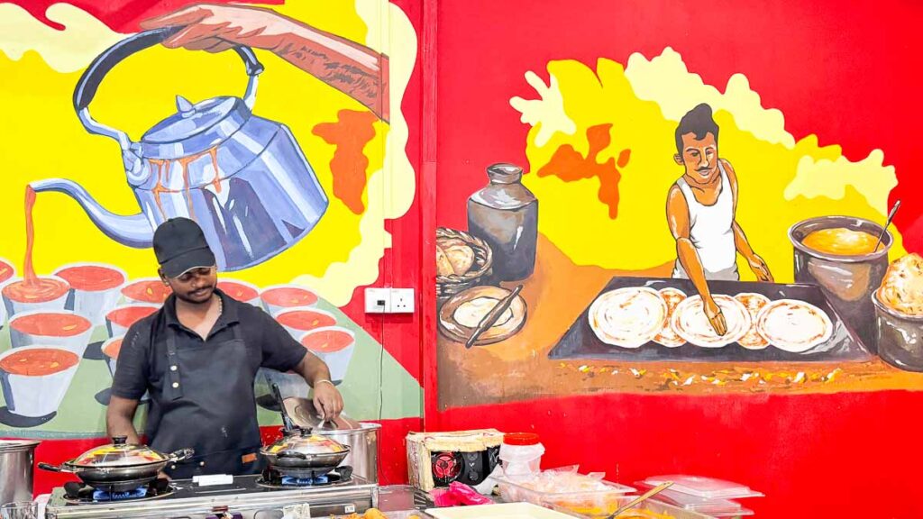 Staff standing at snack station at Madras - Skudai Food Guide