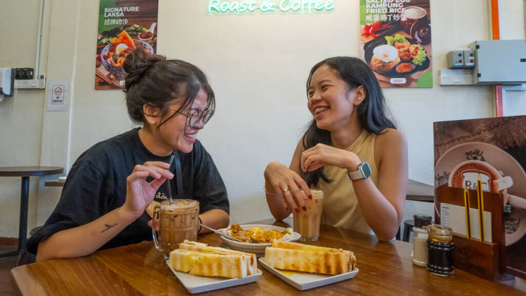 Friends eating together at Roast and Coffee - Things to eat in Jalan Tan Hiok Nee