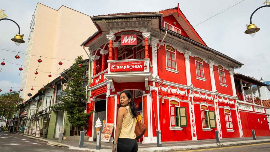 Woman posing in front of Marrybrown building - Things to do at Jalan Tan Hiok Nee