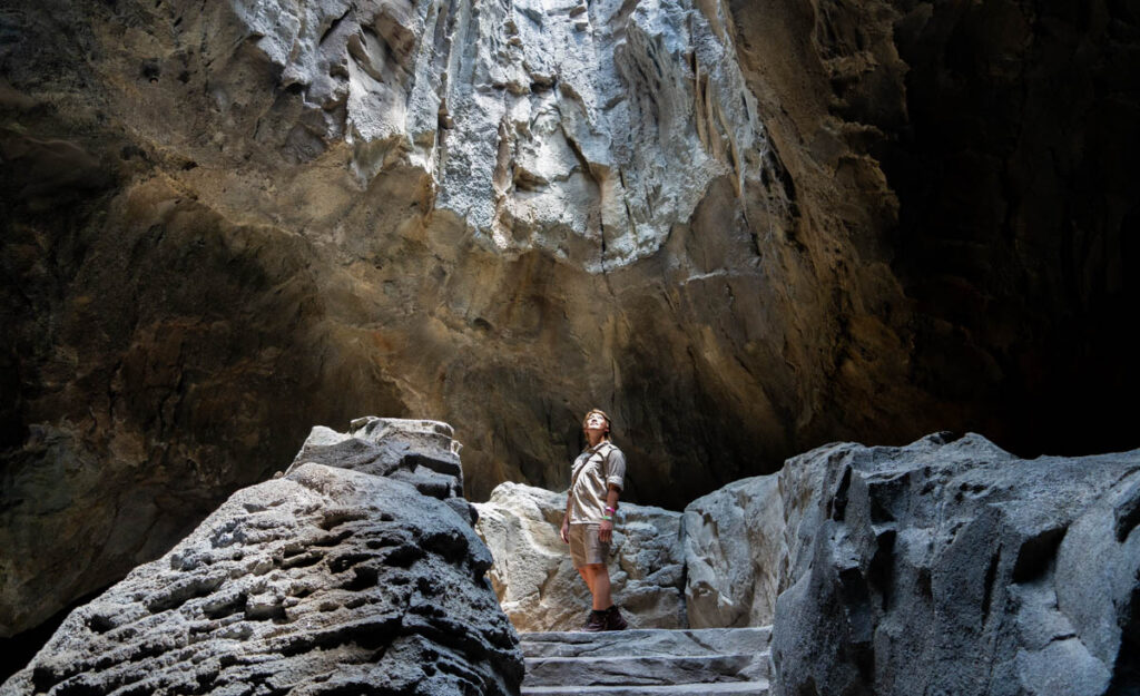 boy in cave - rainforest Wild Asia_