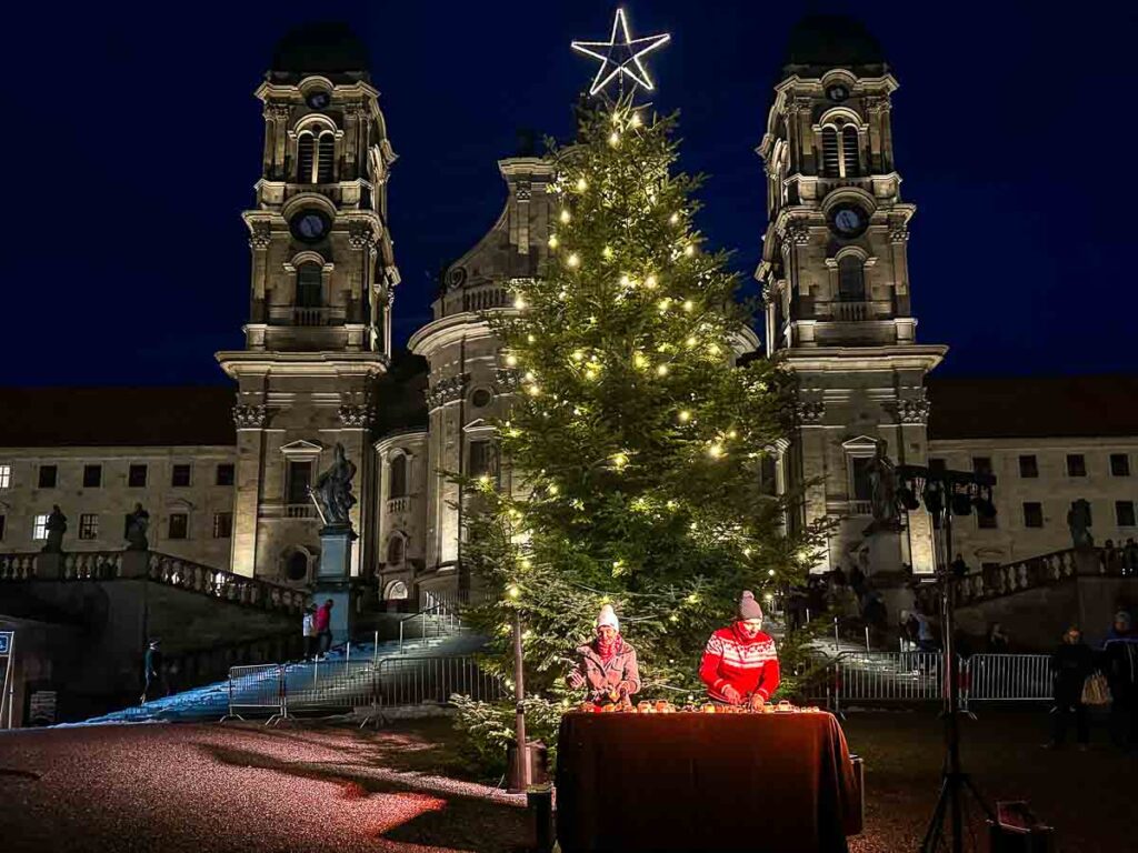 Cowbell performance at Einsiedeln Christmas Market - Things to do in Einsiedeln