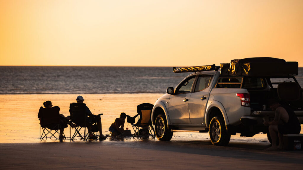 People parked and relaxing by the beach - Things to do in Broome