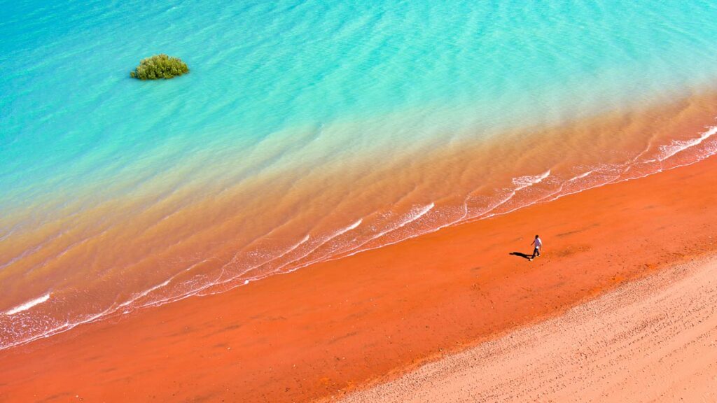 man walking on beach - Things to do in Broome