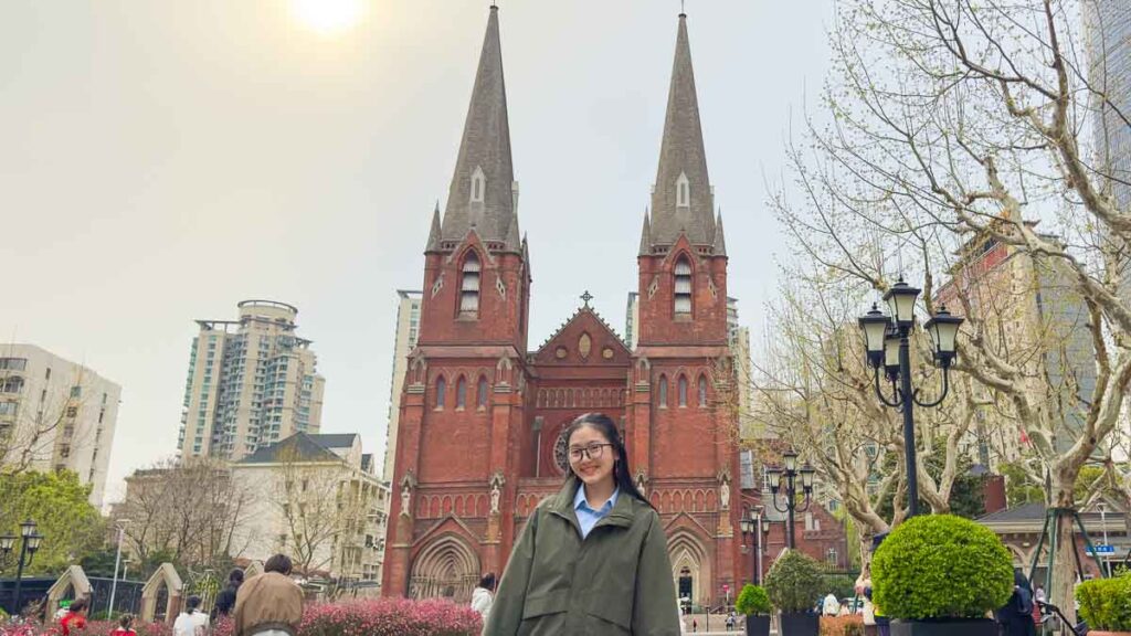 Girl posing before St Ignatius Cathedral in Shanghai - Hidden gem in Shanghai