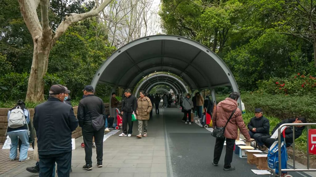 Elderly people at the Marriage Market Corner - People's Park