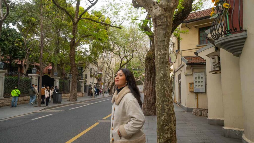 Cece standing on the street along Wukang Road - Things to do in Shanghai