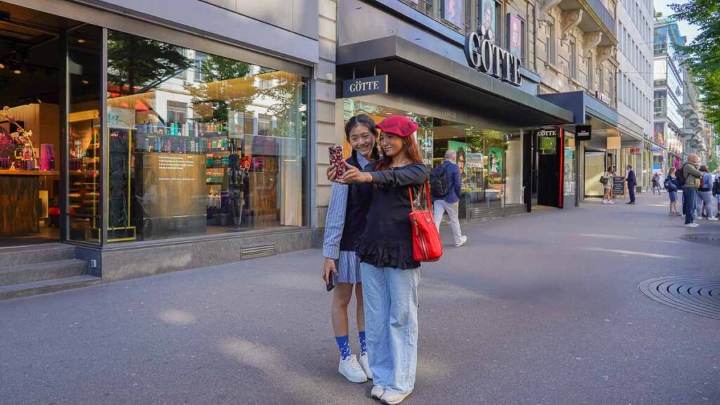 2 girls using phone in Bahnohfstrasse - Nomad eSIM guide