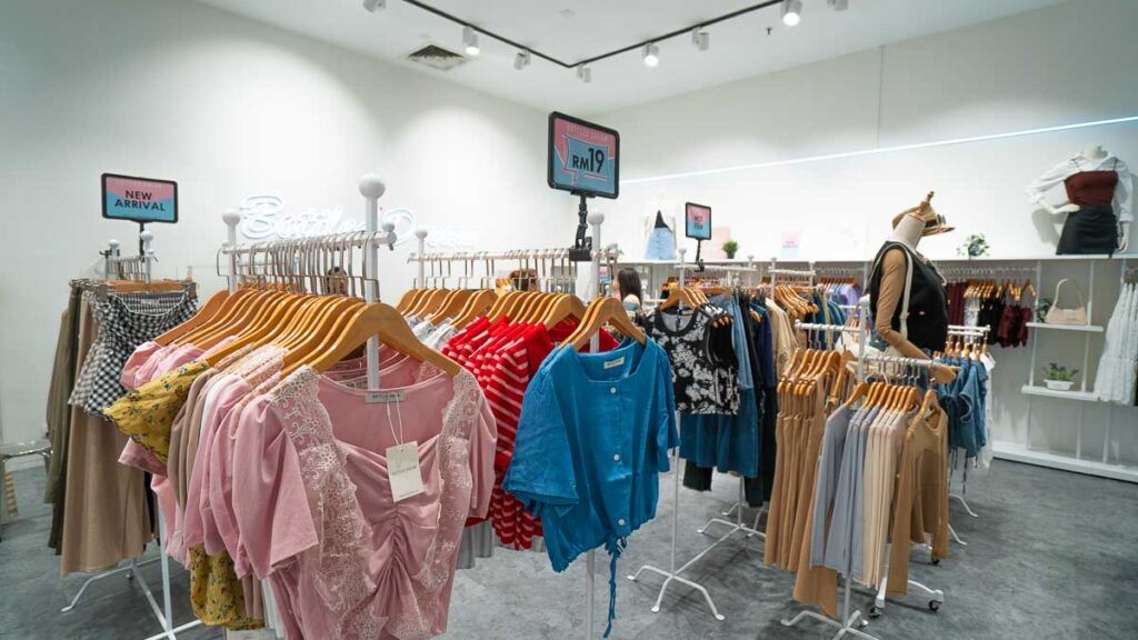 racks of clothes at Bottled Dreams in KSL JB
