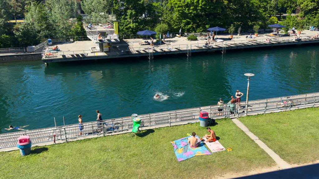 People chilling by the Obere Letten - what locals do in zurich