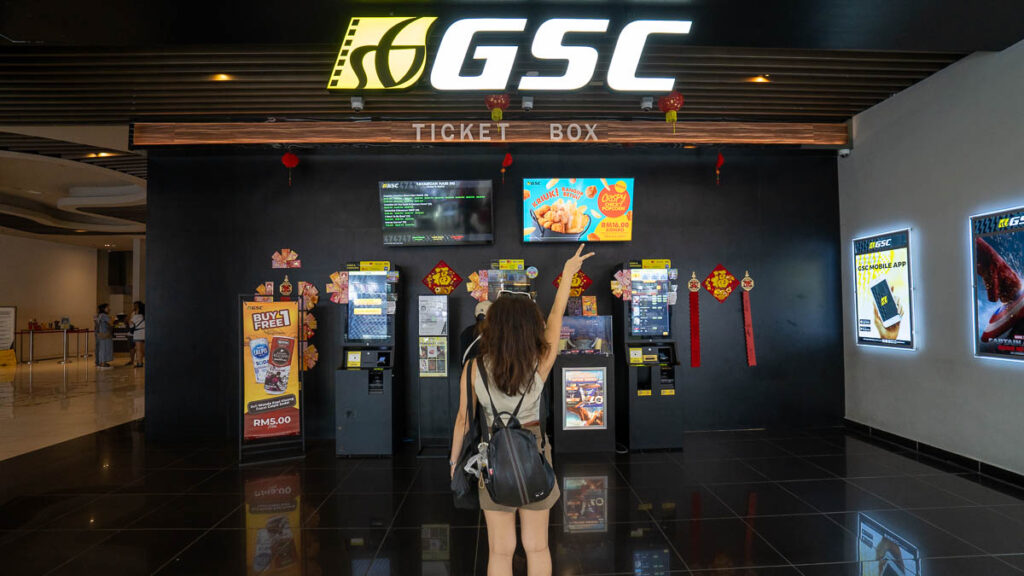 Girl posing in front of GSC Cinema in JB shopping malls