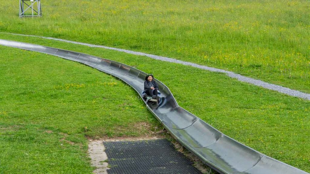 Tracey going down the toboggan - Atzmannig mountain