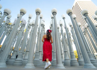 Girl posing in front of LACMA Urban Lights - Los Angeles Attractions